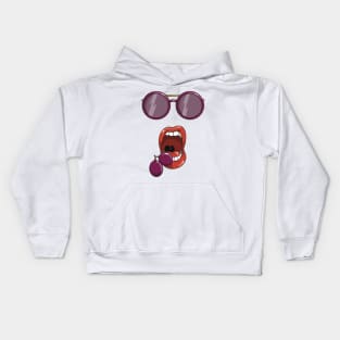 Mouth about to eat a two purple grapes while wearing matching purple sun glasses. Kids Hoodie